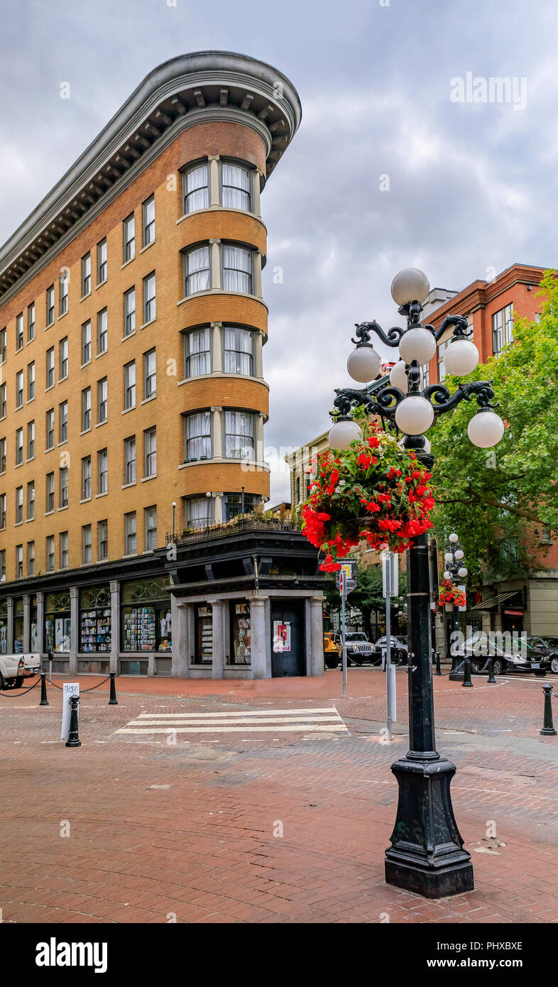 August 03, 2018 - Vancouver, Canada: Flatiron building of Hotel Europe, heritage building on Powell Street in Gastown Stock Photo