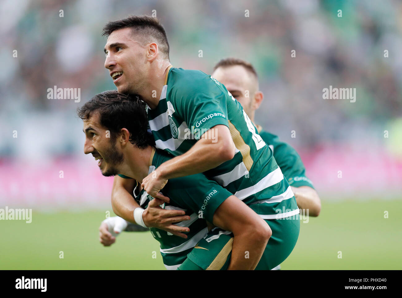 BUDAPEST, HUNGARY - MAY 12: (r-l) Leandro De Almeida 'Leo' of Ferencvarosi  TC celebrates the goal with Roland Varga of Ferencvarosi TC during the  Hungarian OTP Bank Liga match between Ferencvarosi TC