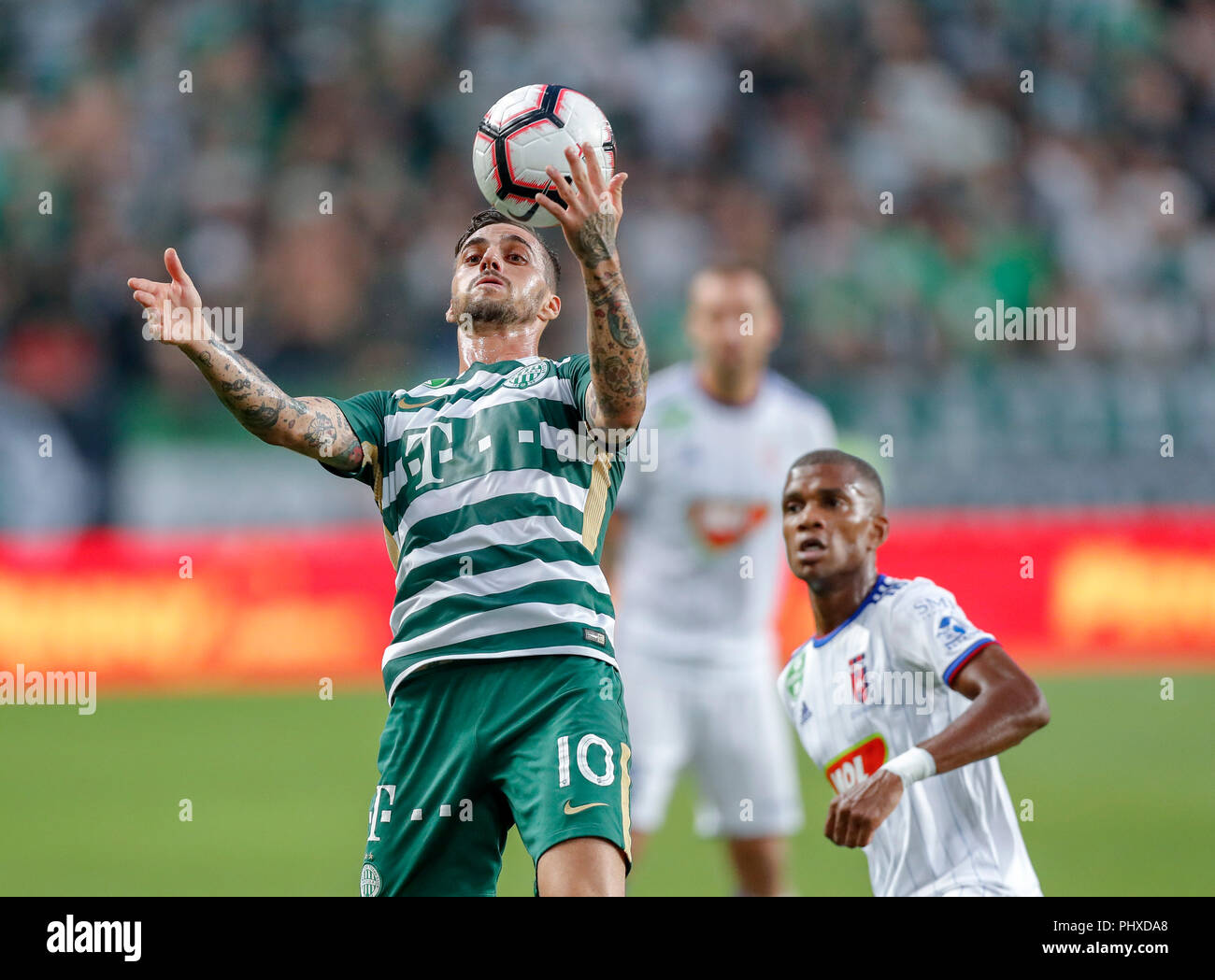 BUDAPEST, HUNGARY - MARCH 2: (r-l) David Markvart of DVTK controls the ball  next to Roland Varga of Ferencvarosi TC during the Hungarian OTP Bank Liga  match between Ferencvarosi TC and DVTK