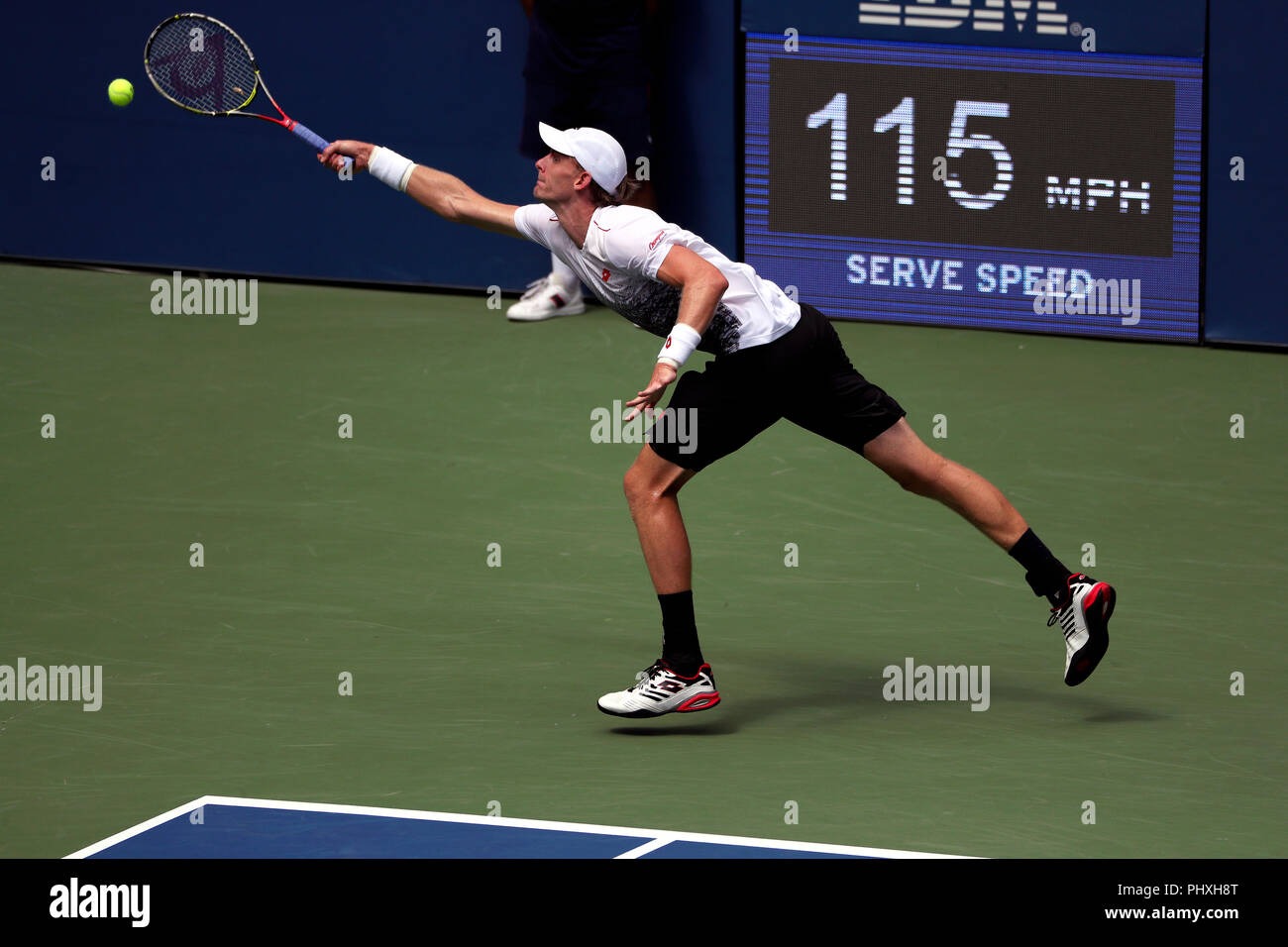 New York, United States. 02nd Sep, 2018. Flushing Meadows, New York - September 2, 2018: US Open Tennis: Kevin Anderson of South Africa reaches wide for a forehand return against Number 9 seed, Dominic Thiem of Austria during their fourth round match at the US Open in Flushing Meadows, New York. Thiem won in straight sets. Credit: Adam Stoltman/Alamy Live News Stock Photo