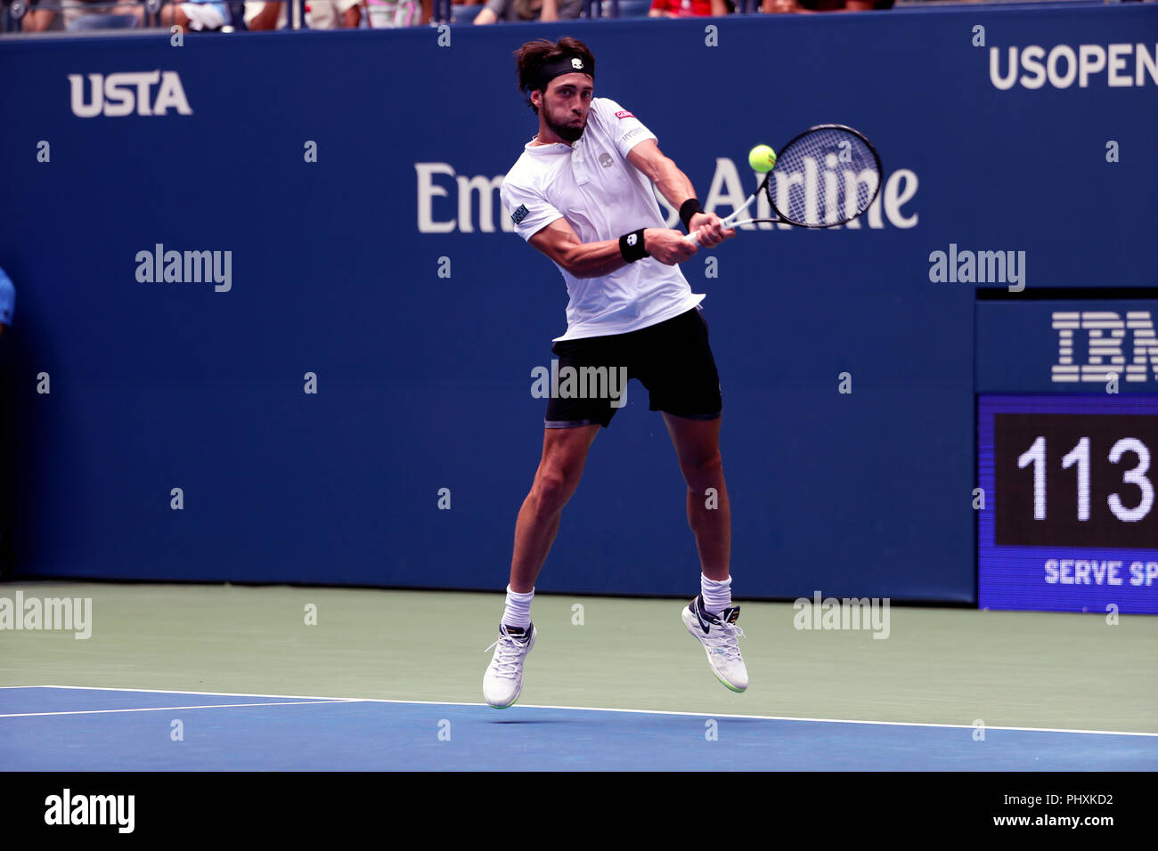New York, United States. 02nd Sep, 2018. Flushing Meadows, New York - September 2, 2018: US Open Tennis: Nikoloz Basilashvili of the Republic of Georgia returns the ball to number 1 seed Rafael Nadal during their fourth round match at the US Open in Flushing Meadows, New York. Nadal won in four sets. Credit: Adam Stoltman/Alamy Live News Stock Photo