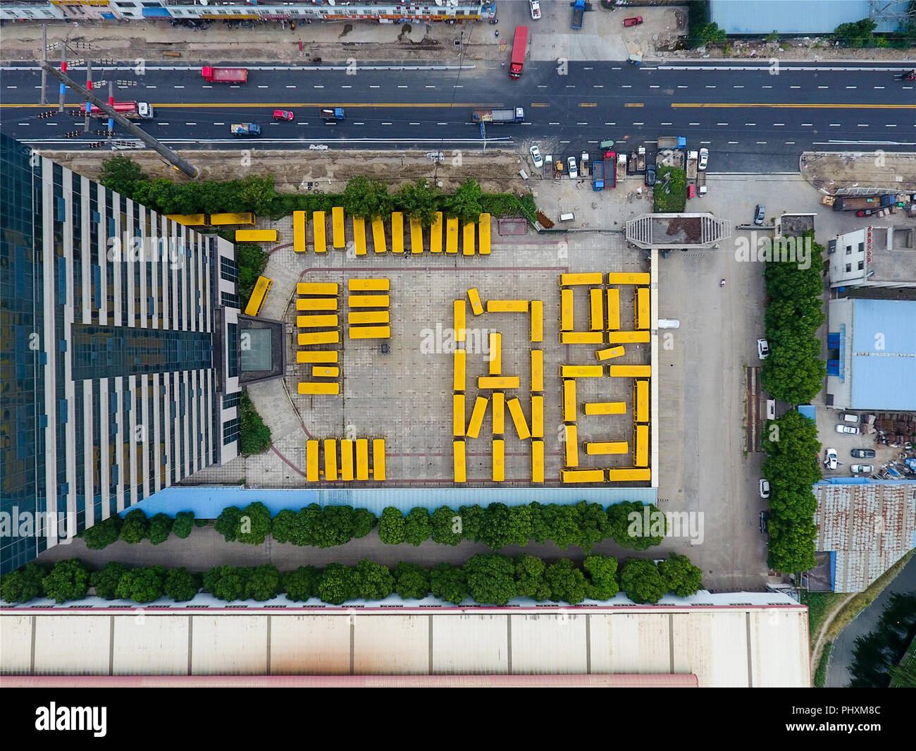 Wuxi, Wuxi, China. 3rd Sep, 2018. Wuxi, CHINA-Aerial photography of 88 schoolbuses can be seen at a parking lot in Wuxi, east China's Jiangsu Province. Credit: SIPA Asia/ZUMA Wire/Alamy Live News Stock Photo