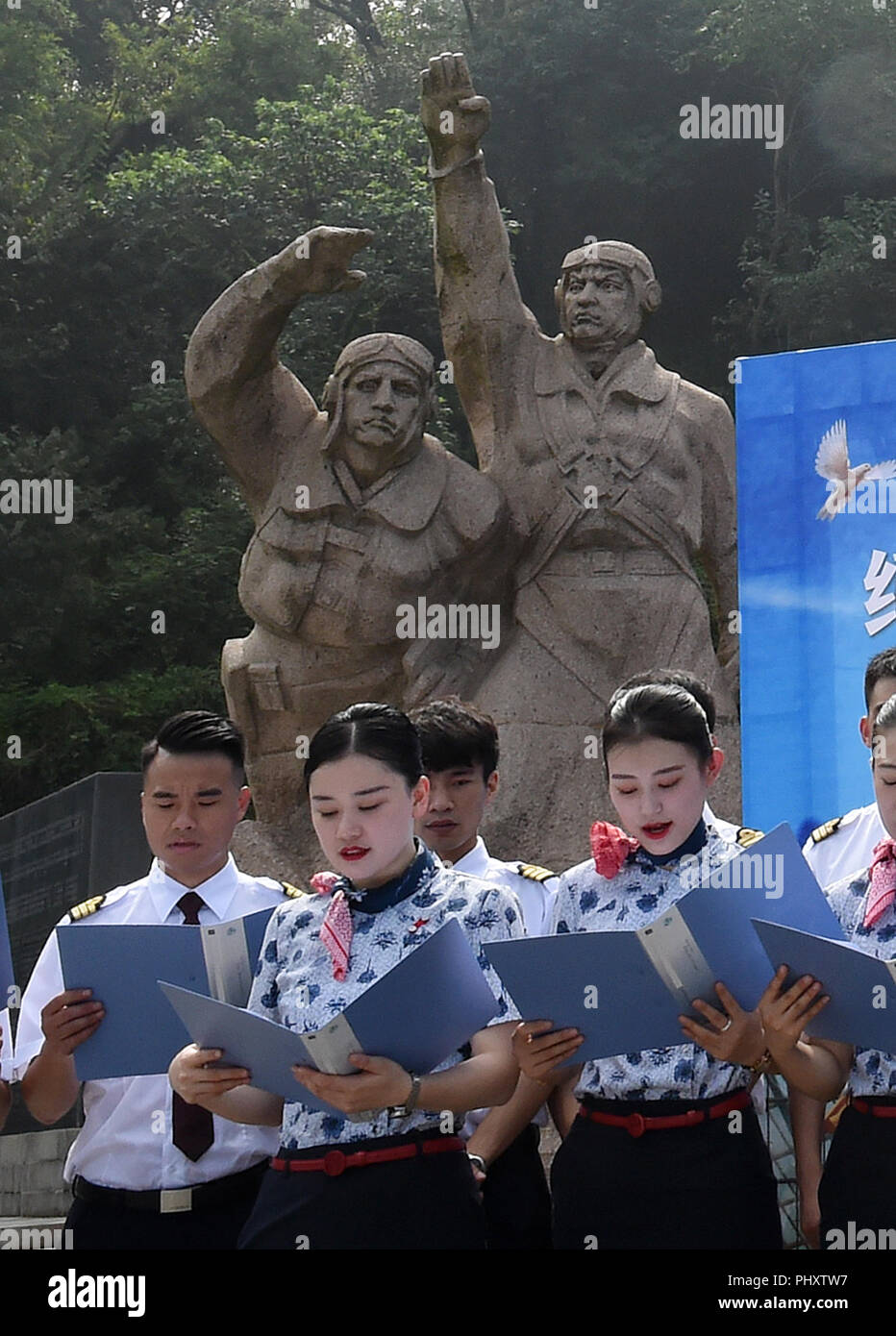 Nanjing, China's Jiangsu Province. 3rd Sep, 2018. Airline staff recite poems during an activity to commemorate the 73rd anniversary of the victory in the Chinese People's War of Resistance Against Japanese Aggression at Nanjing Anti-Japanese Aviation Martyr Memorial Hall in Nanjing, east China's Jiangsu Province, Sept. 3, 2018. Credit: Sun Can/Xinhua/Alamy Live News Stock Photo