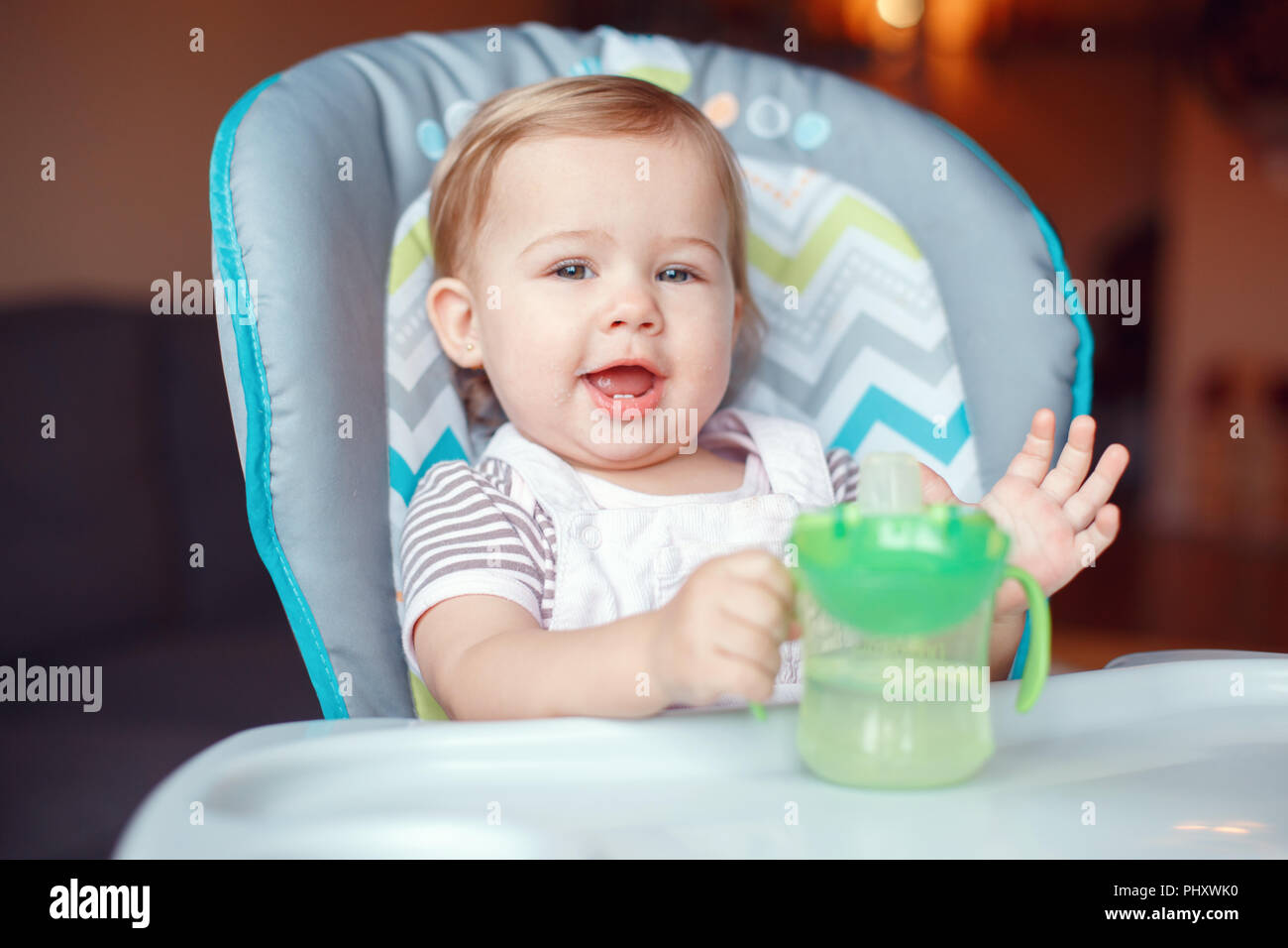 Portrait Of Cute Adorable Caucasian Child Kid Girl Sitting