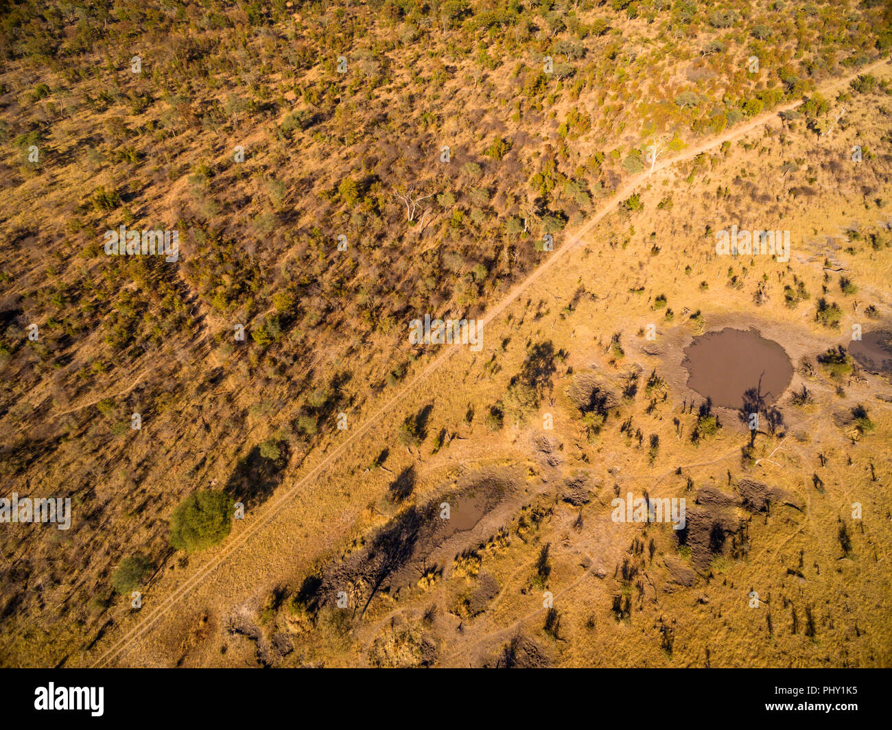 The border of Hwange national park is seen from the air. Stock Photo