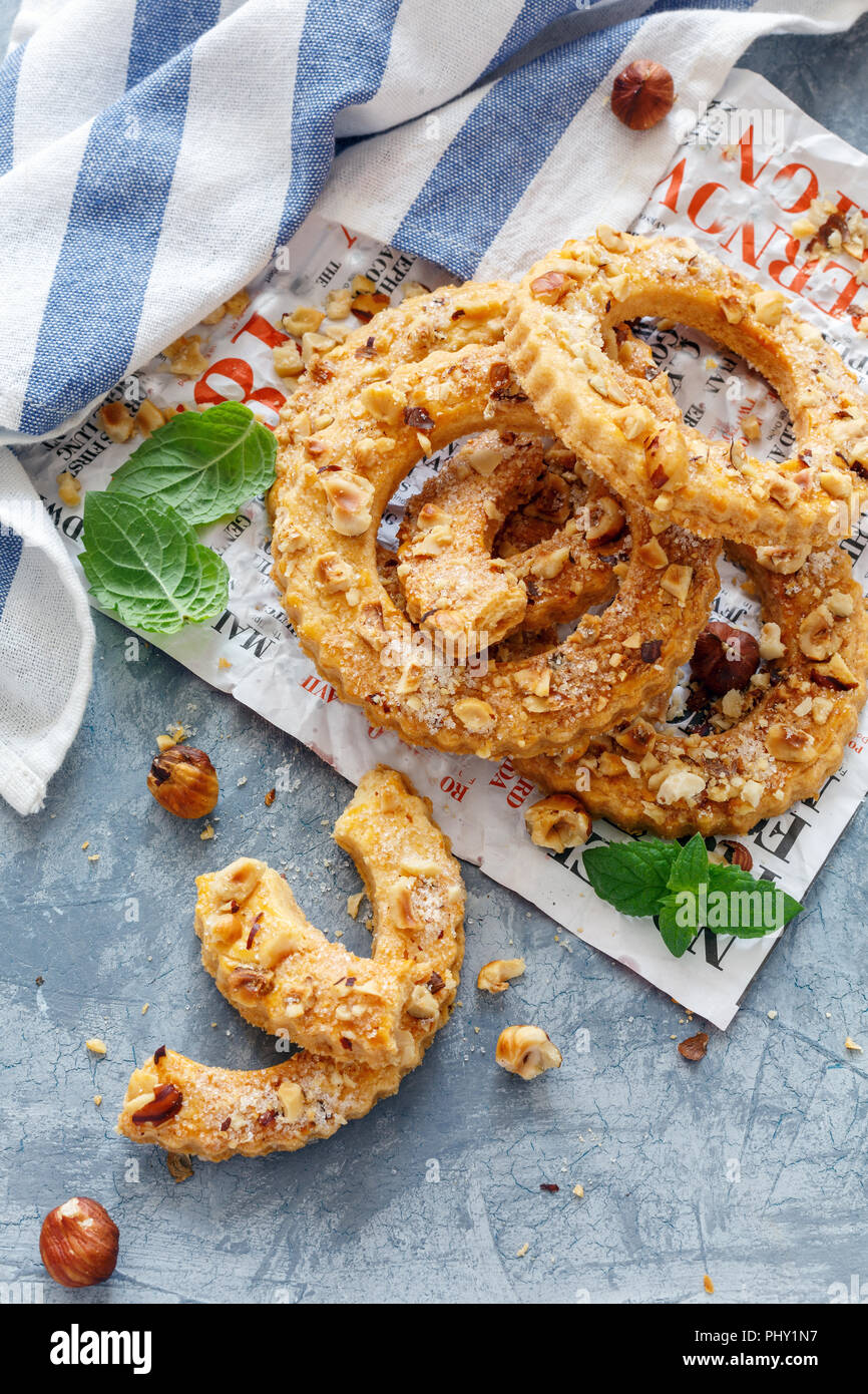 Homemade cookies sprinkled with sugar and hazelnut. Stock Photo