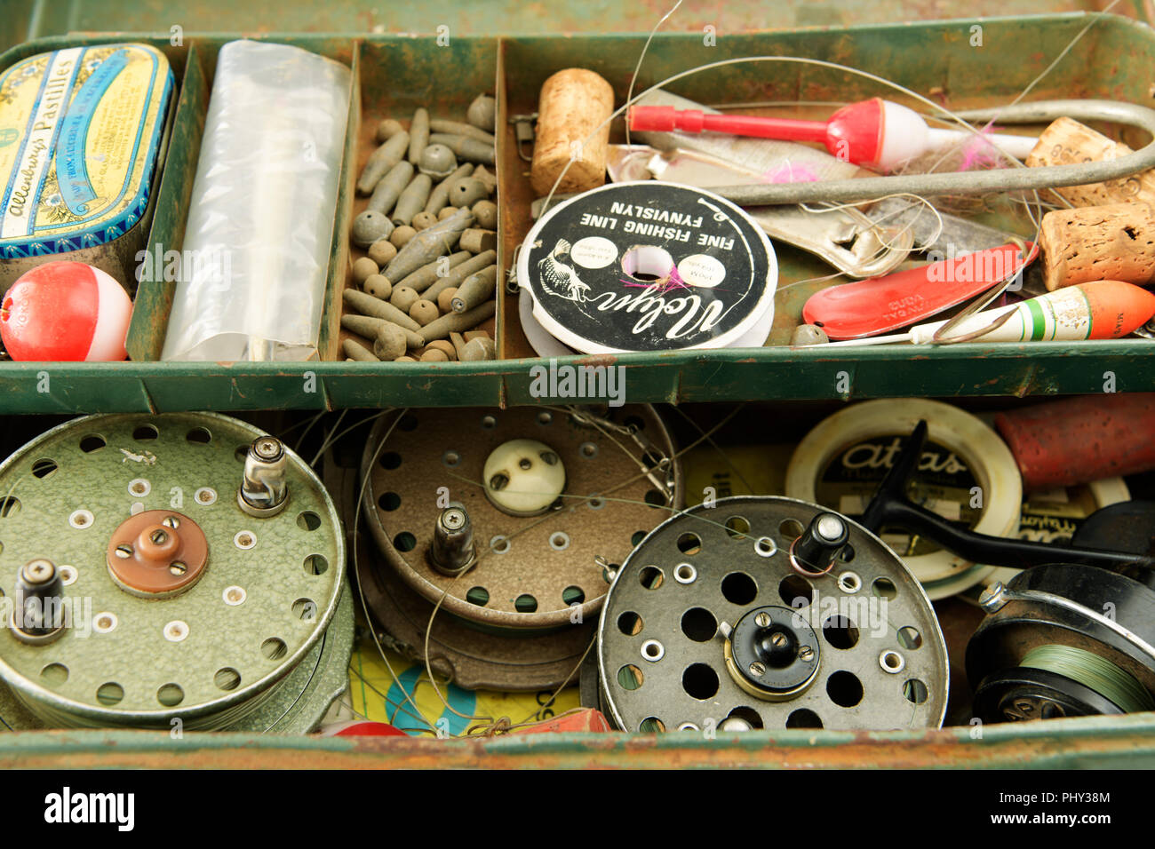 Interesting old objects used for fishing in weathered vintage container box  Stock Photo - Alamy