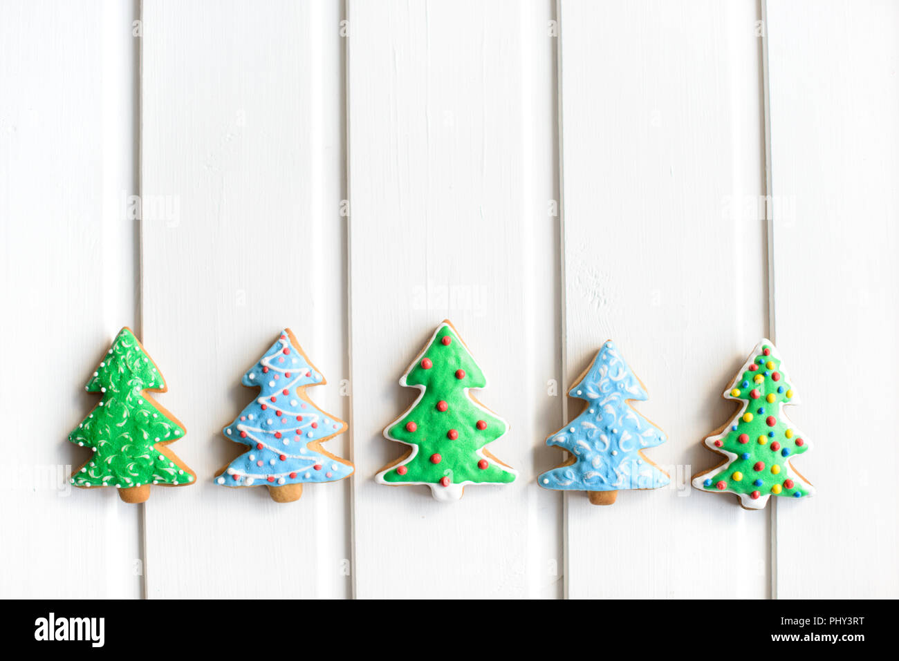 christmas cookies in shape of fir tree with festive decoration on white wooden background new year and christmas concept free copy space - Free Christmas Images To Copy christmas cookies in shape of fir tree with festive decoration on white wooden background new year and christmas concept free copy space - Free Christmas Images To Copy