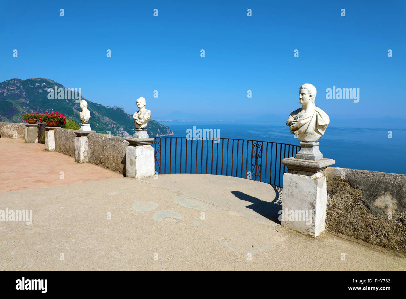 Stone statues on sunny Terrace of Infinity in Villa Cimbrone above the sea in Ravello, Amalfi Coast, Italy Stock Photo