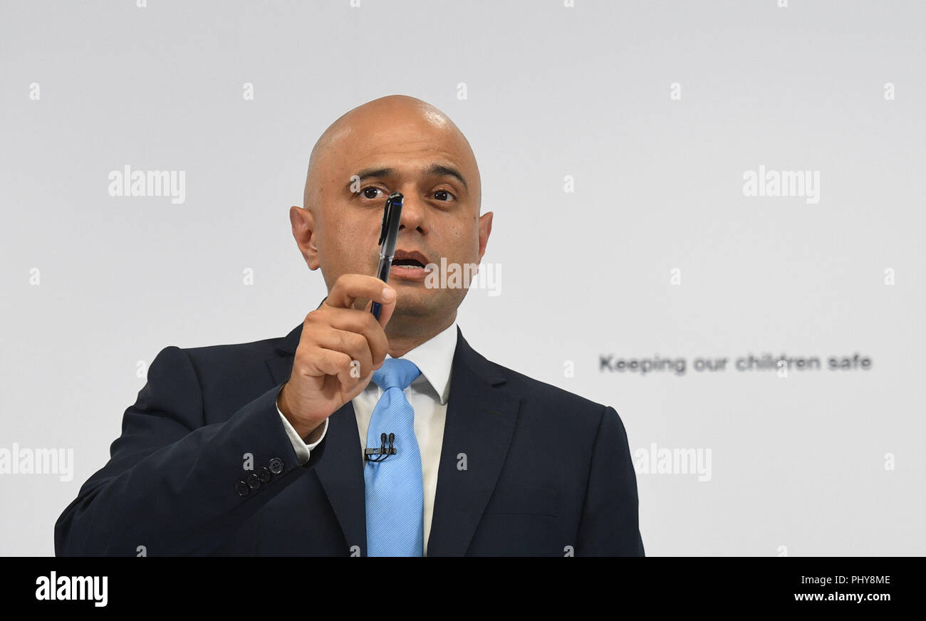 Home Secretary Sajid Javid speaking at the Home Office in London where he described his shock at discovering the scale of the danger posed by paedophiles on the internet and outlined his 'personal mission' to tackle child abuse in all its forms. Stock Photo