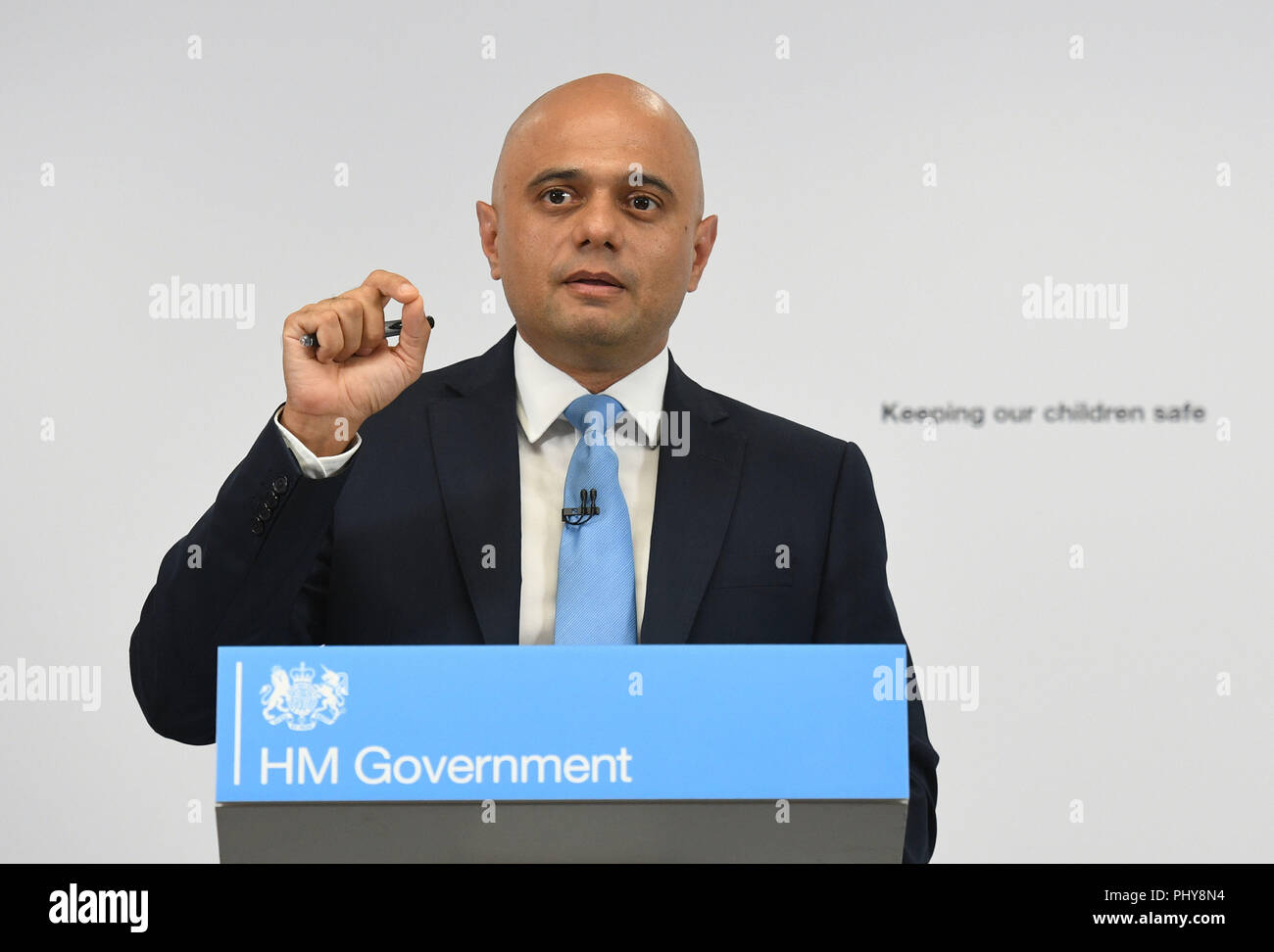 Home Secretary Sajid Javid speaking at the Home Office in London where he described his shock at discovering the scale of the danger posed by paedophiles on the internet and outlined his 'personal mission' to tackle child abuse in all its forms. Stock Photo