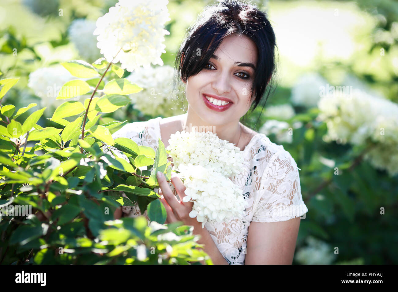 beautiful young woman in the park Stock Photo - Alamy
