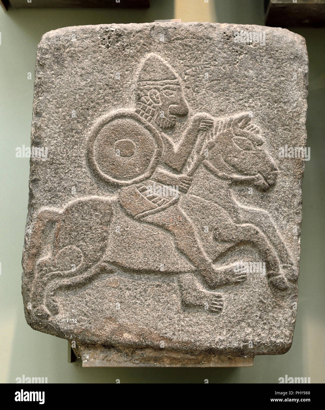Relief carving from the Tell Halaf, (Iron Age city in NE Syria,  c1200-900BC) Mounted Soldier. British Museum, Bloomsbury, London, England,  UK Stock Photo - Alamy