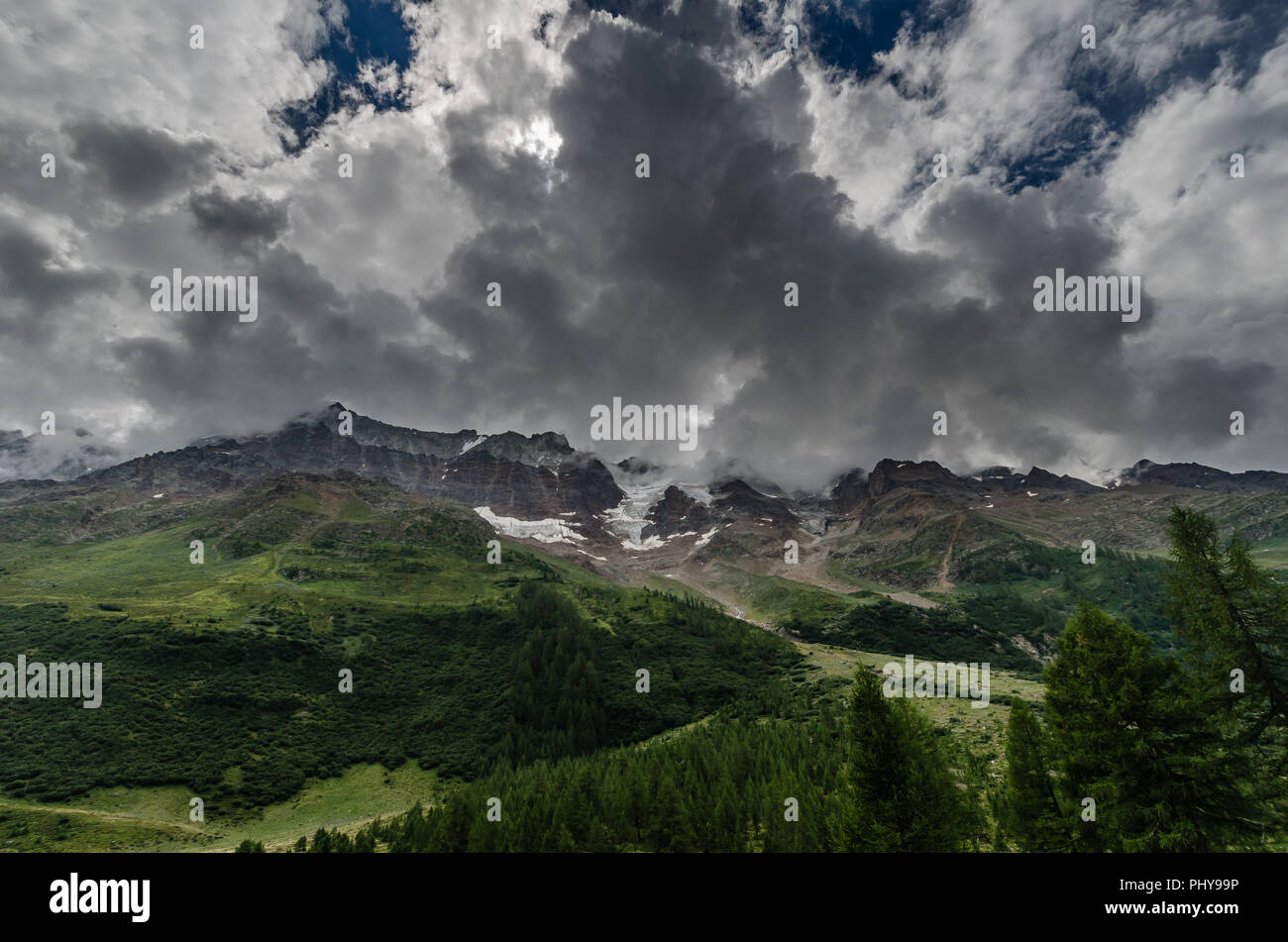 Dark clouds over the mountains hi-res stock photography and images - Alamy