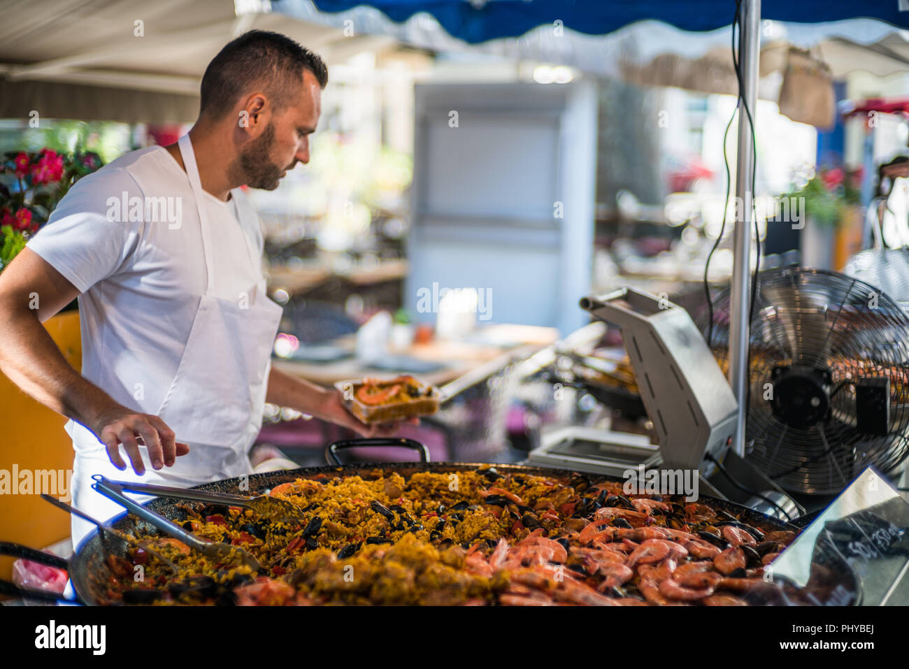 Paella, Street market in the Oranfe, Provence, France, Europe Stock