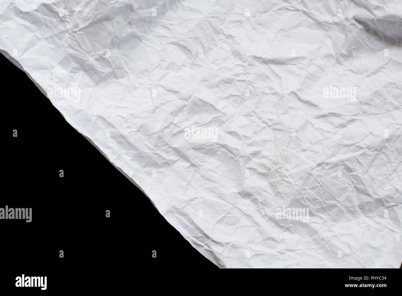 Paper texture. White crumpled paper isolated on black background Stock Photo