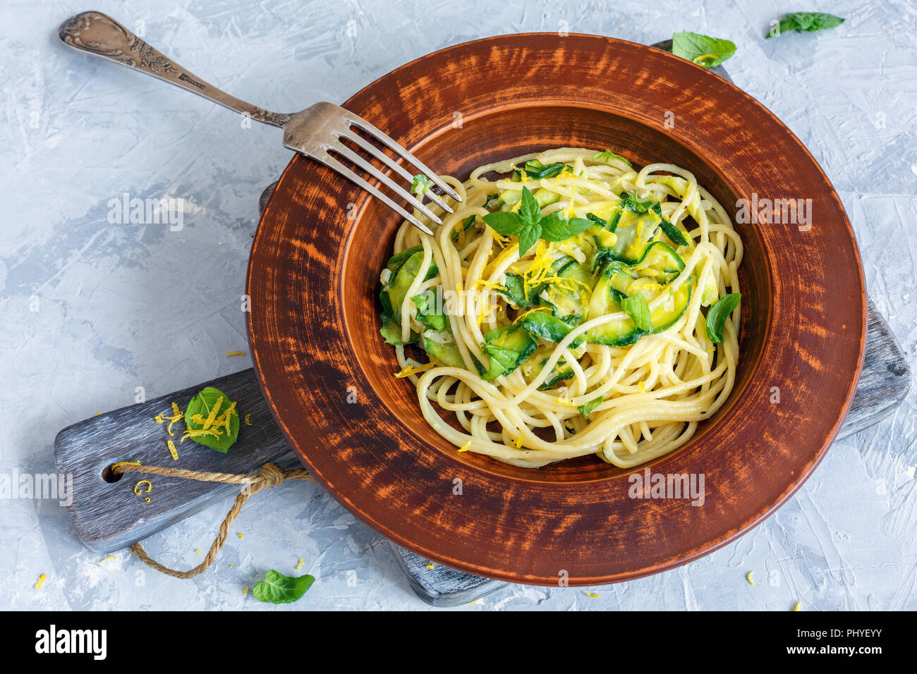 Spaghetti with zucchini and fresh mint Stock Photo - Alamy