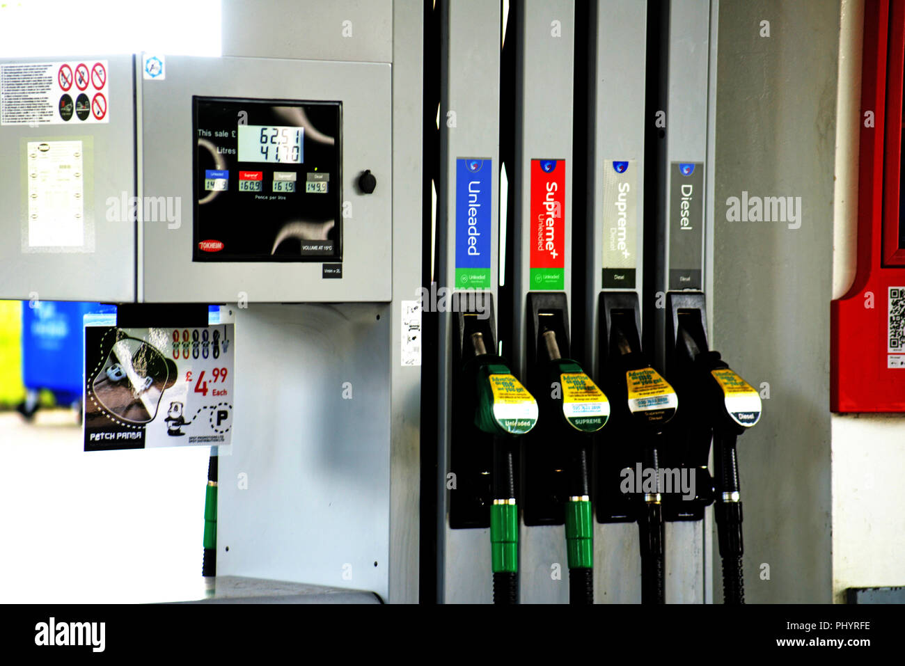 UK Service area Esso Fuel Pumps with 4 choices of fuel. Stock Photo