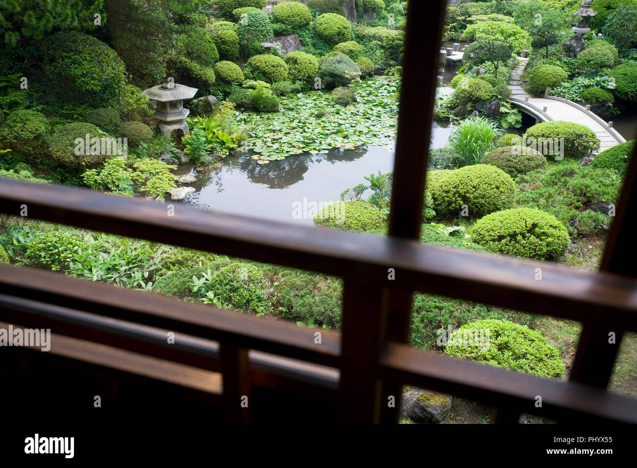 Photo shows  the delicately carved woodwork at the head of the Photo shows  the Kakubuen garden as viewed from the 2nd floor  of the main building of  Stock Photo