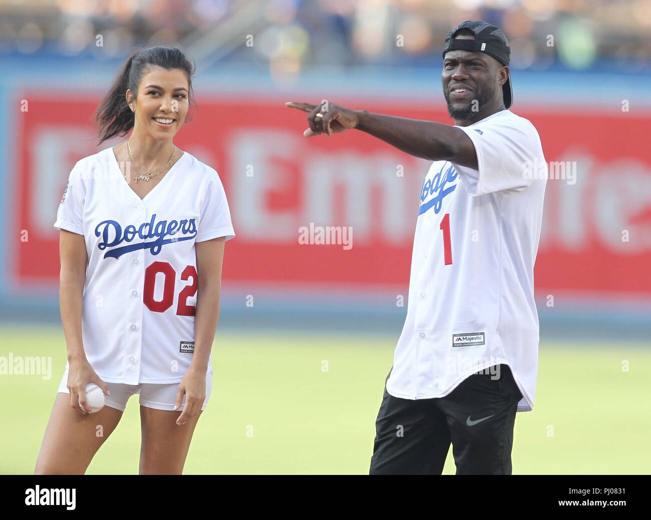 Kourtney Kardashian and Kevin Hart throw out the first pitch as the Los(02)