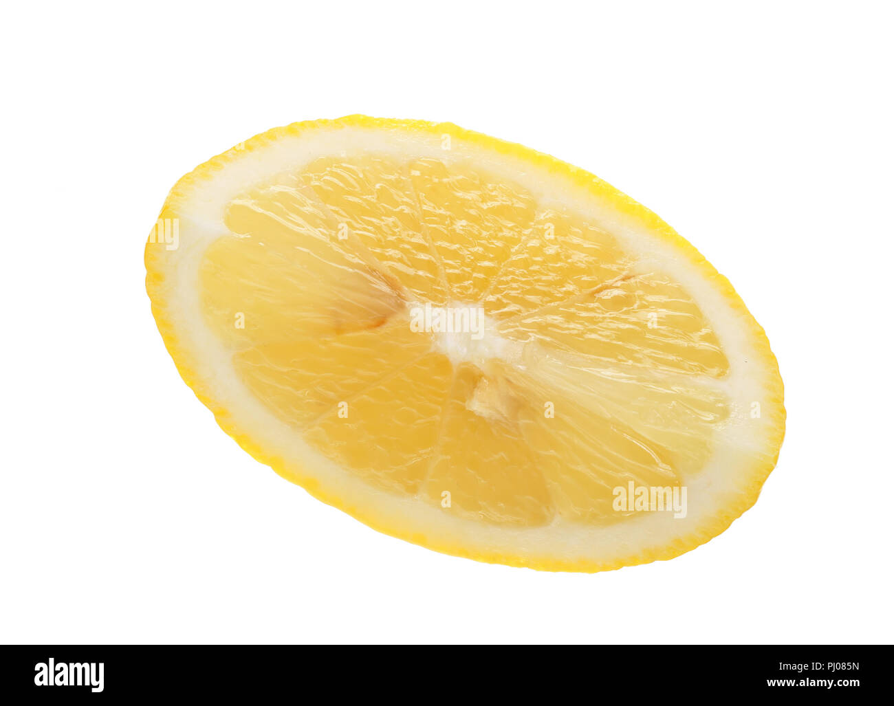 lemon slice isolated on white background closeup. Stock Photo