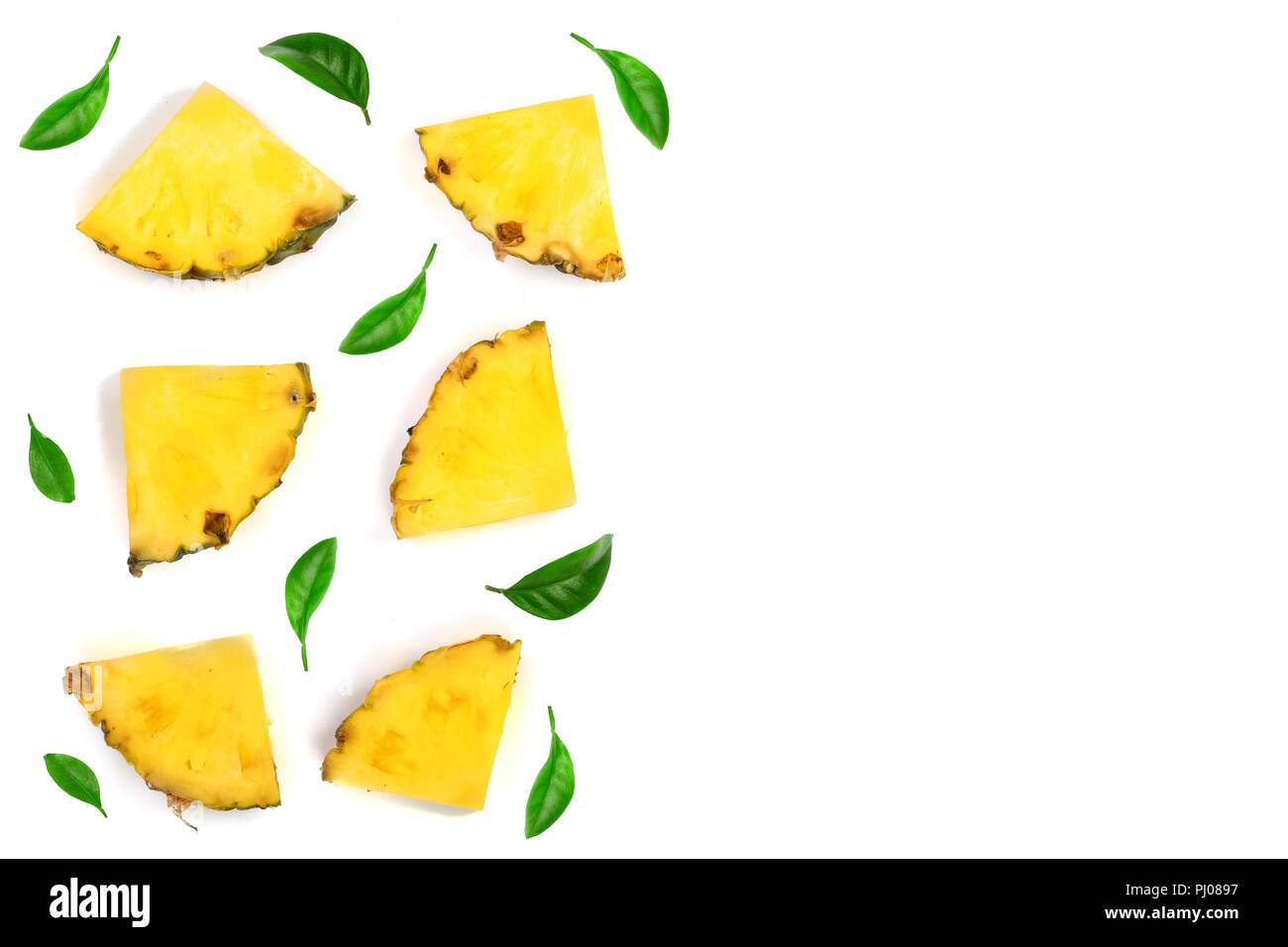 Sliced pineapple decorated with green leaves isolated on white ...