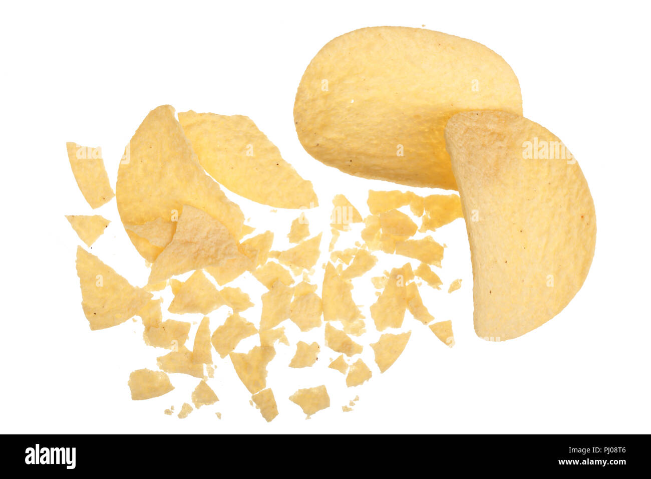 Potato chips crumbs and leftovers isolated over the white background
