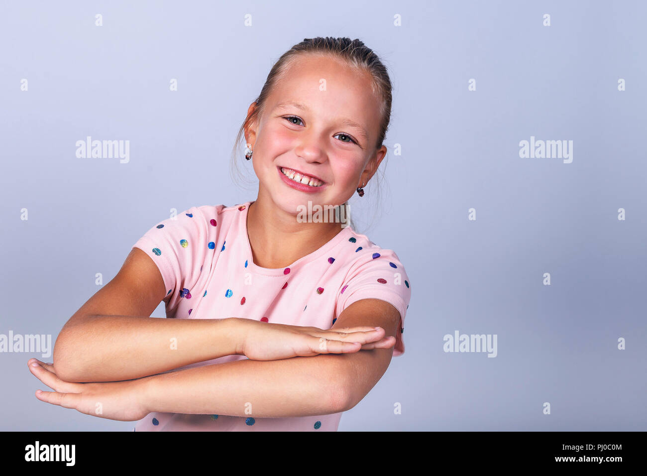 Girl with folded hands hi-res stock photography and images - Alamy