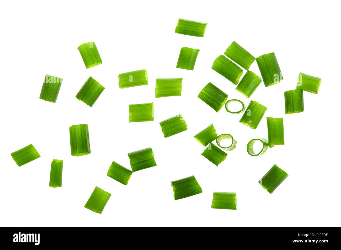 Chopped fresh green onions isolated on white background. Top view. Flat lay Stock Photo