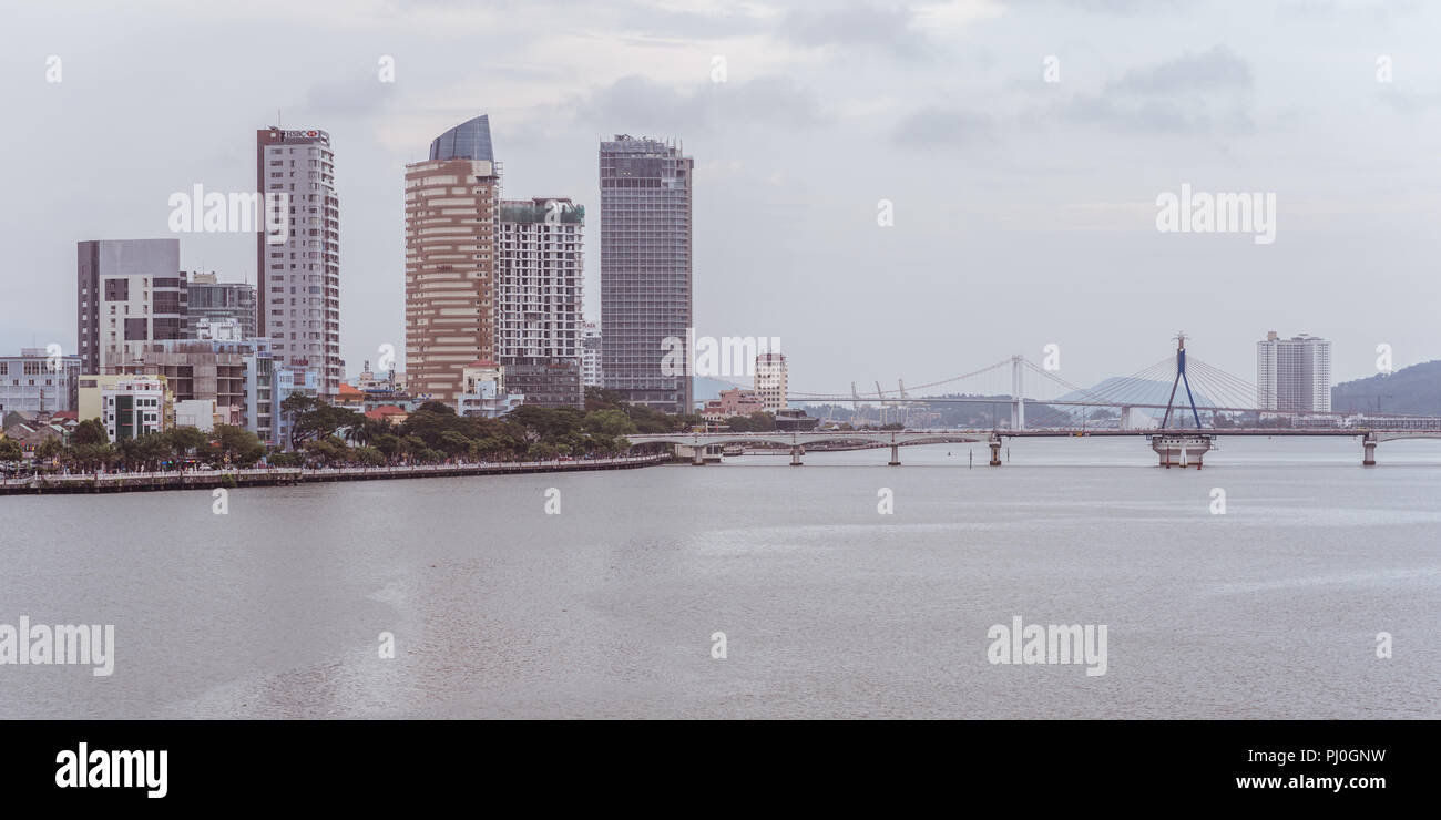 Da Nang downtown: the Han River, Song Han Bridge, Thuan Phuoc Bridge, the embankment (Bach Dang Street) with 5-star Novotel Danang Hotel. Stock Photo