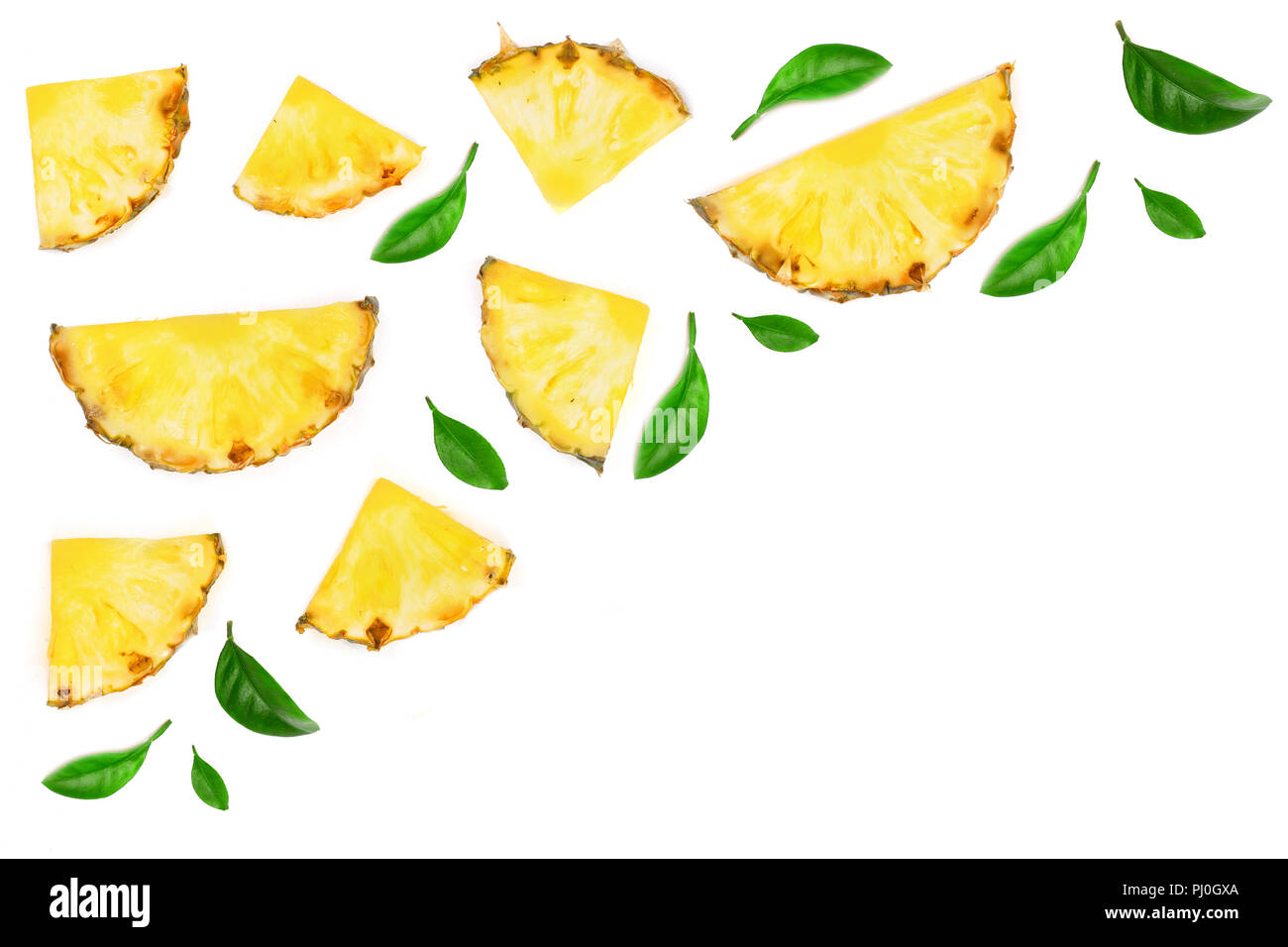 Sliced pineapple decorated with green leaves isolated on white ...