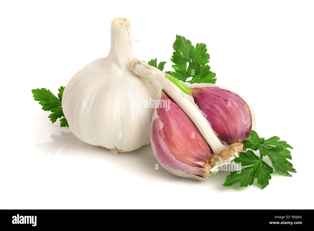 garlic with parsley leaf isolated on white background Stock Photo - Alamy