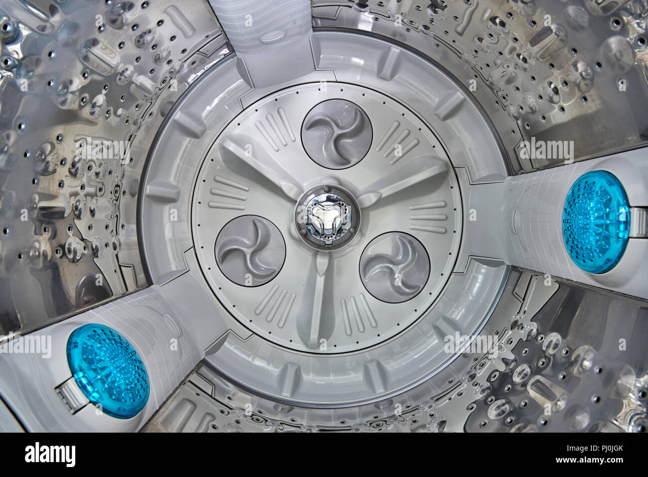 inside the top load washing machine with dust filter Stock Photo