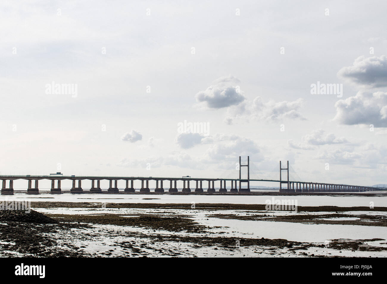 The Prince of Wales Bridge (Second Severn Crossing near the Severn Bridge) looking over the estuary from Severn Beach on the English side near Bristol Stock Photo