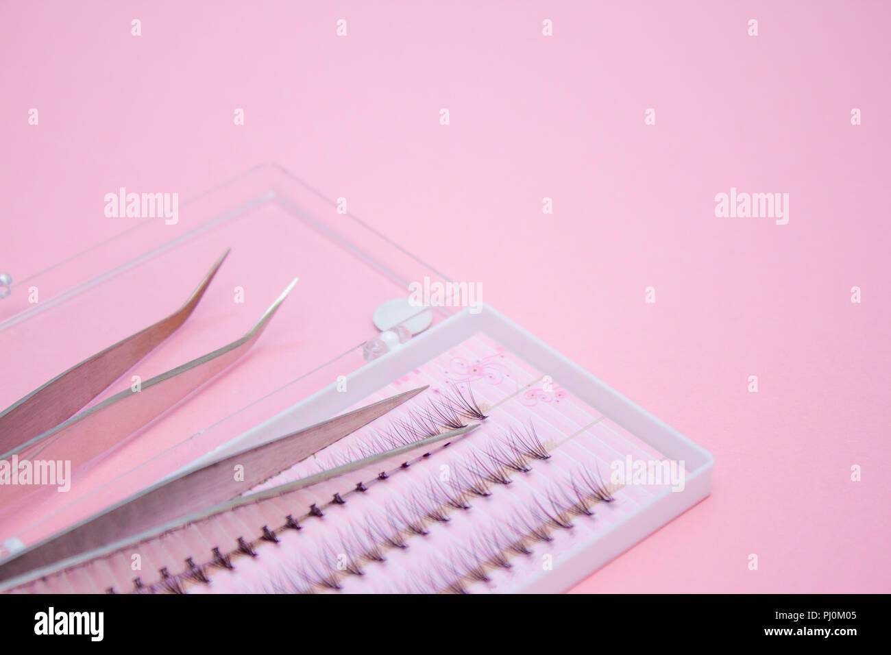 Download Beauty And Fashion Concept Tools For Eyelash Extension Procedure Two Tweezers And Box With False Lashes On Pink Background Copyspace Mockup Stock Photo Alamy