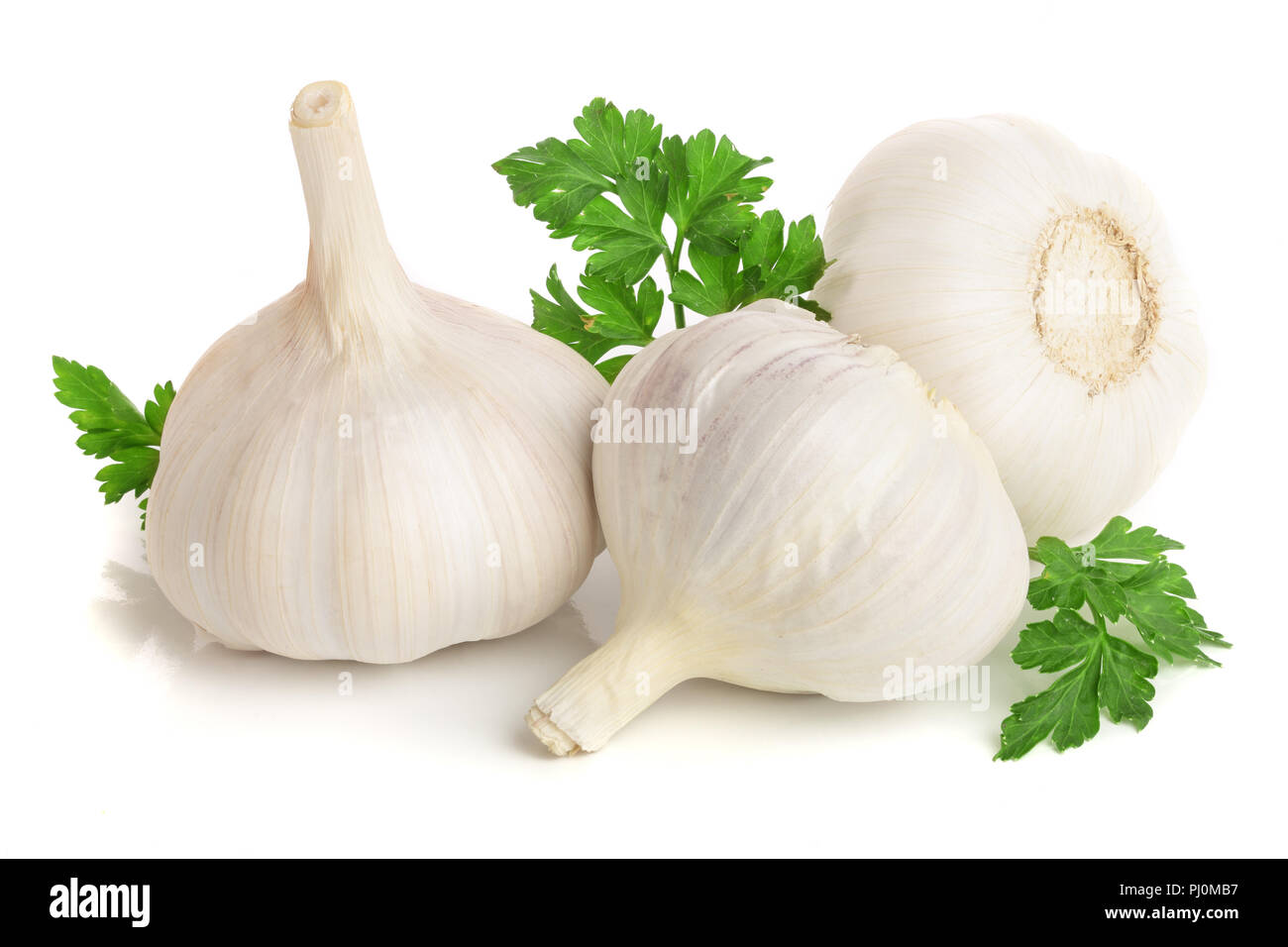 garlic with parsley leaf isolated on white background Stock Photo - Alamy