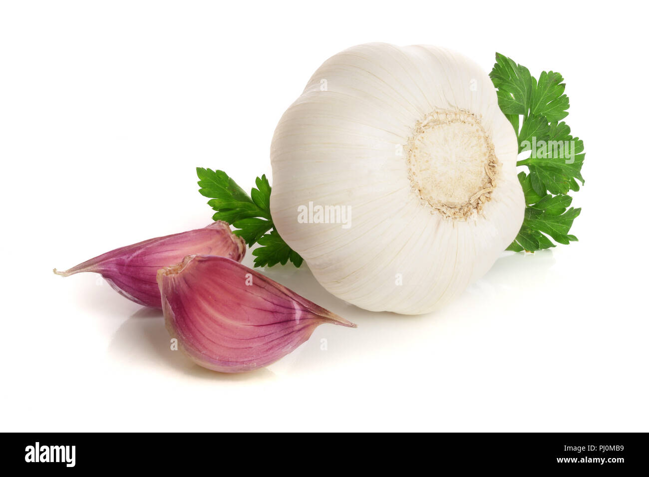 garlic with parsley leaf isolated on white background Stock Photo - Alamy