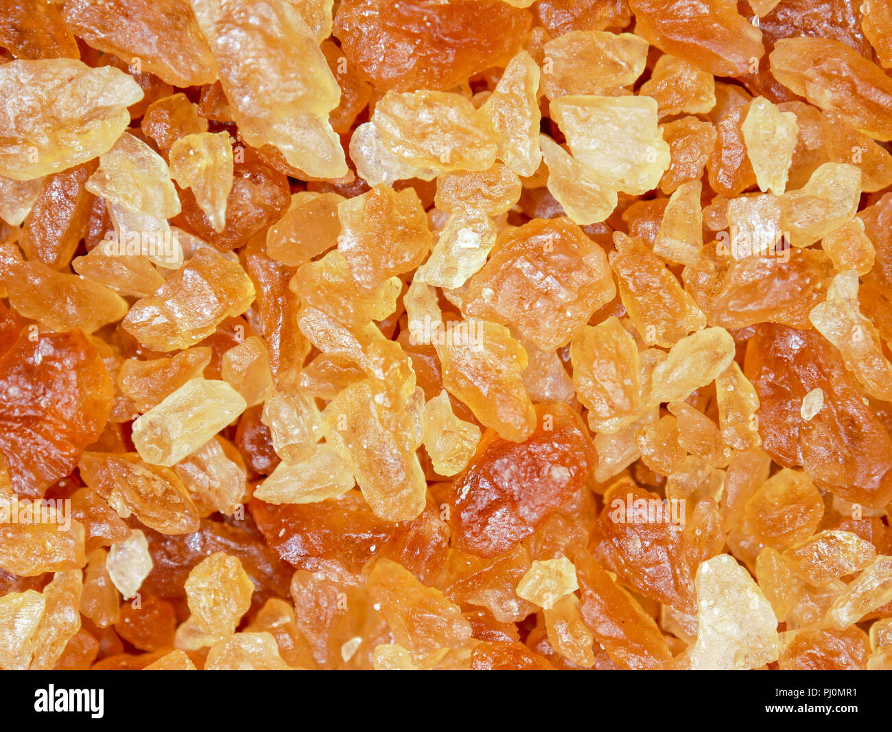 sweet brown rock sugar food texture background Stock Photo