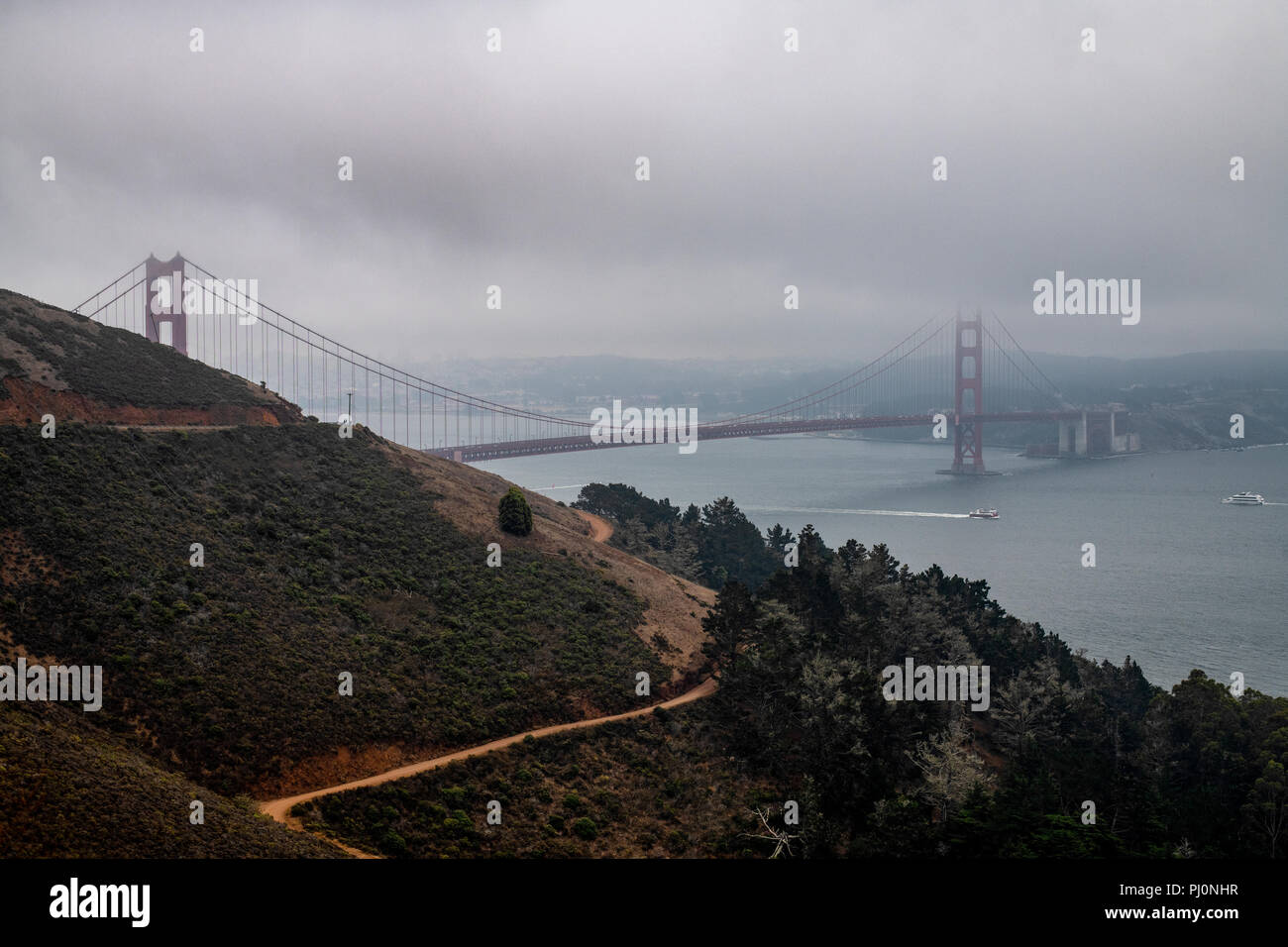 The Golden Gate suspension bridge on a foggy day, San Francisco, California, USA. Stock Photo