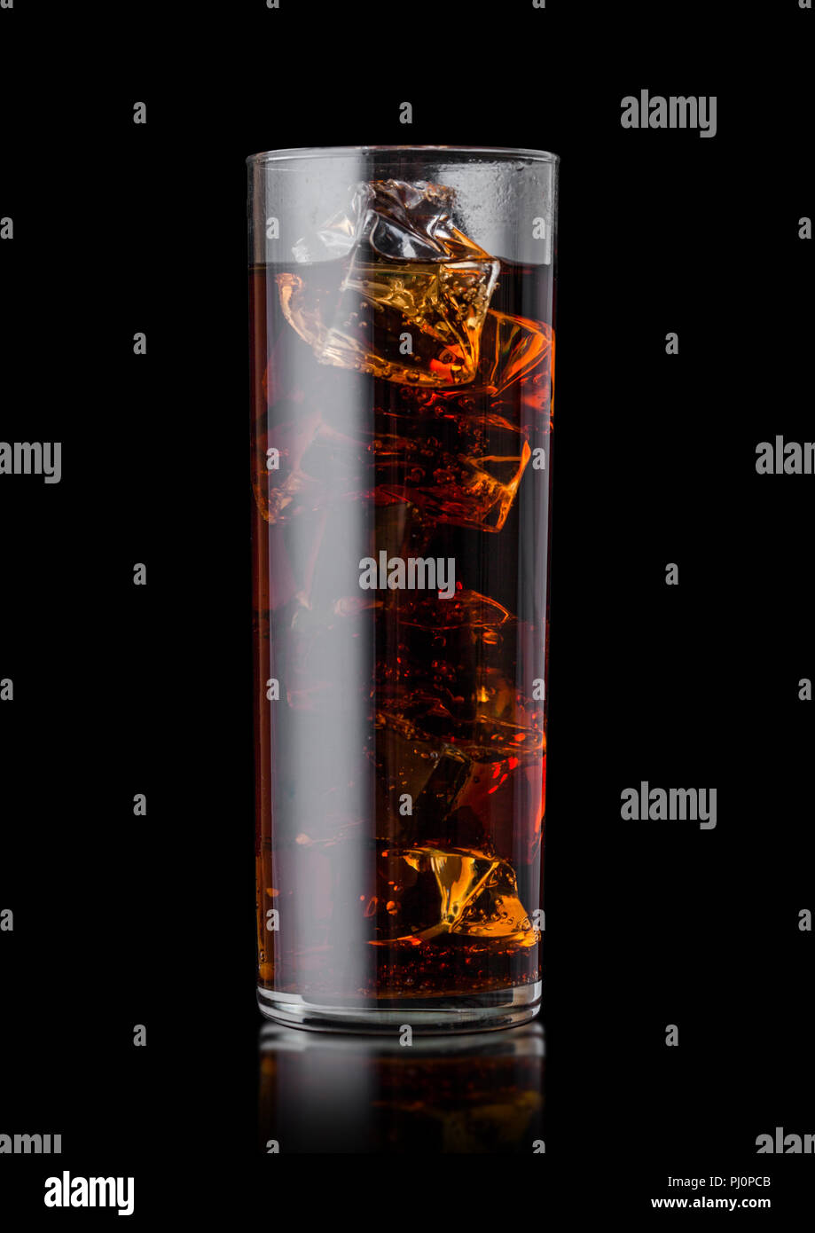 Glass of cola soda drink with ice cubes on black background Stock Photo ...
