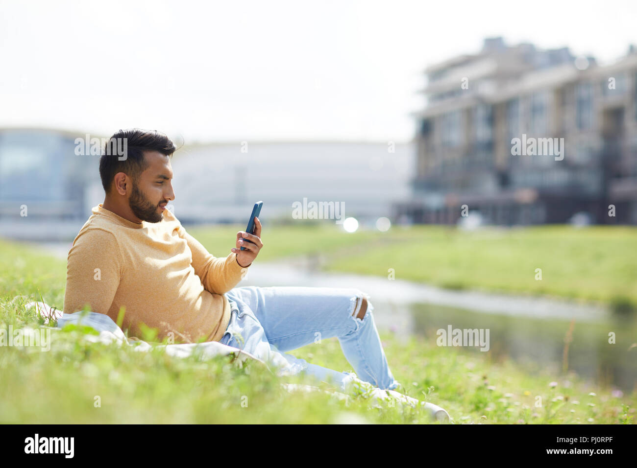 Young adult texting urban hi-res stock photography and images - Alamy