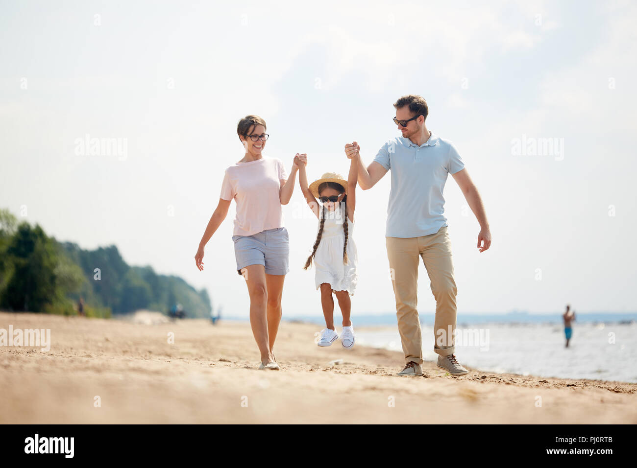 Carefree Family Enjoying Vacation Stock Photo