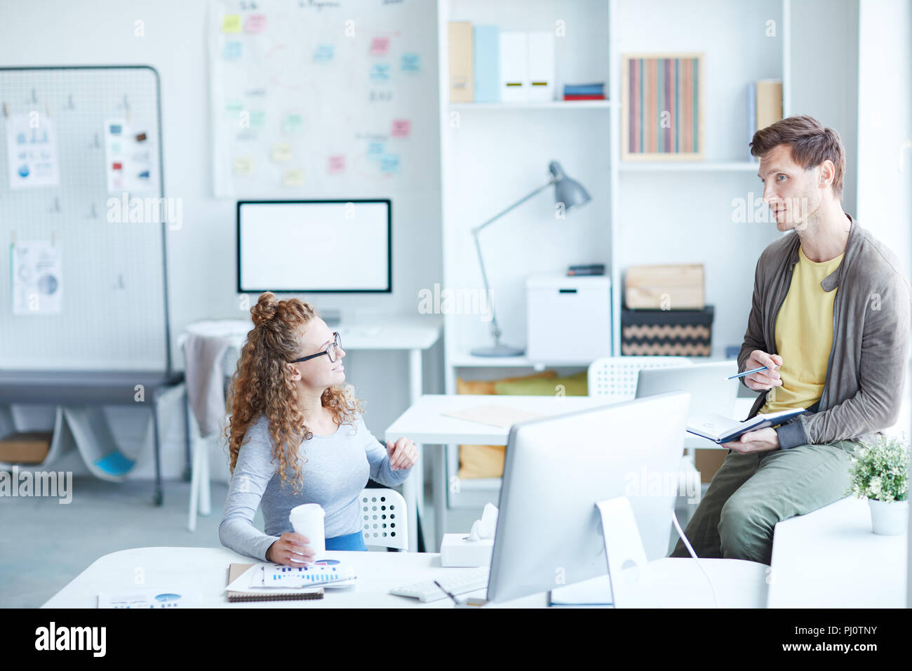 Colleagues in corporate office hi-res stock photography and images - Alamy