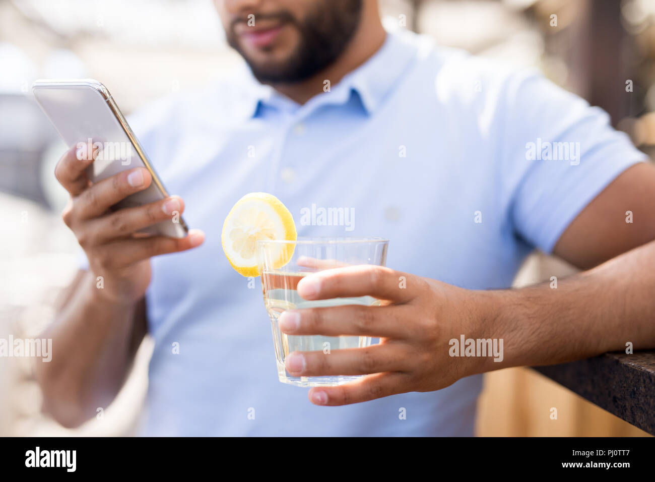 Contemporary Man Using Smartphone Stock Photo