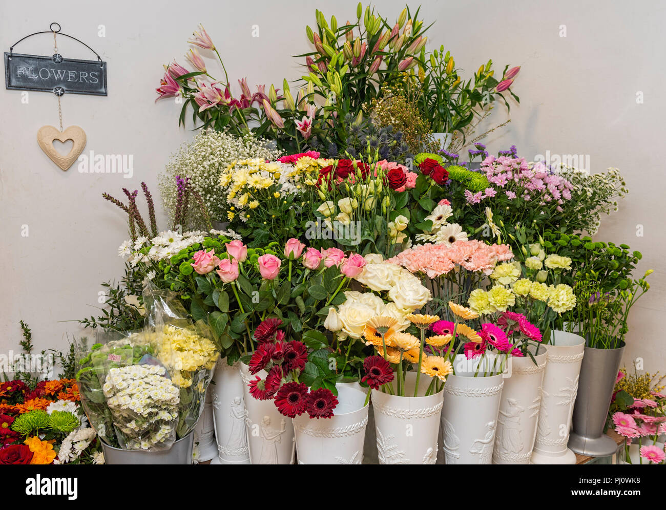 Vases Of Flowers In A Florist Shop Uk Stock Photo 217608364 Alamy