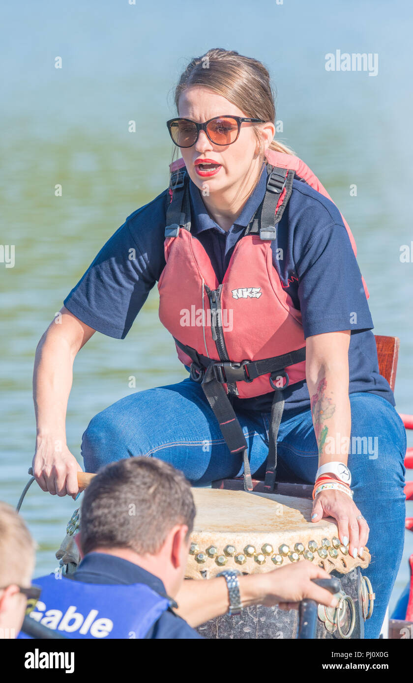 Keen drummer at the dragon boat race organised by East Northants rotary clubs at Wicksteed Park, Kettering on 2 september 2018. Stock Photo