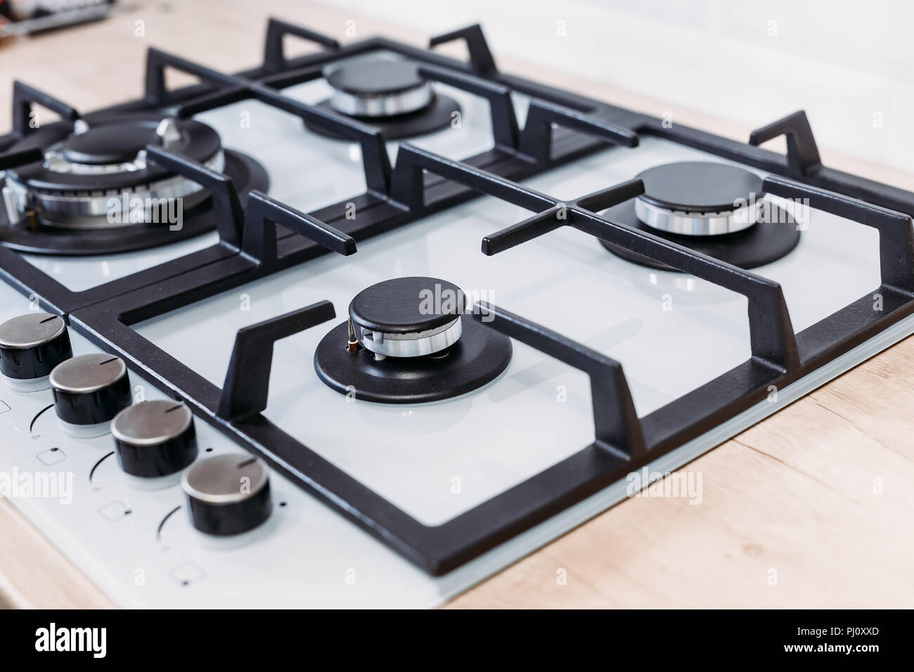 Gas control panel hob in kitchen close up Stock Photo