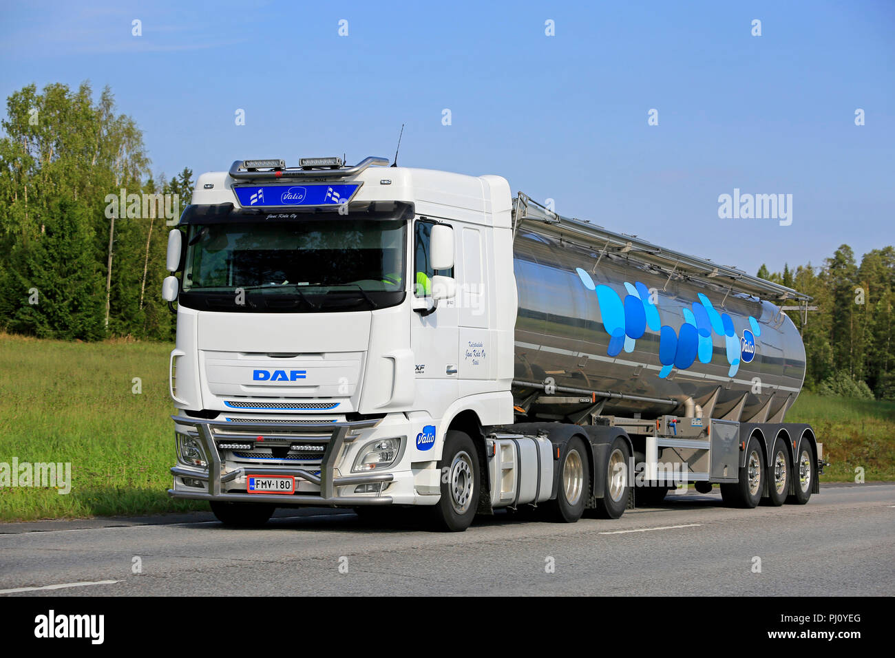DAF XF510 semi tanker of Jani Kola Oy delivers Valio milk in Uurainen, Finland - August 24, 2018. Milk semi tankers are not an usual sight in Finland. Stock Photo