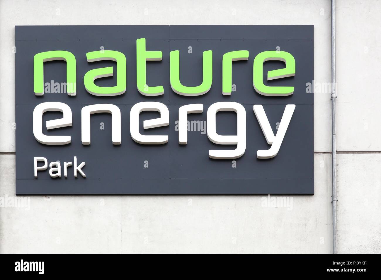 Odense, Denmark - August 16, 2018: Nature Energy Park sign on a wall. Nature Energy Park Stock Photo