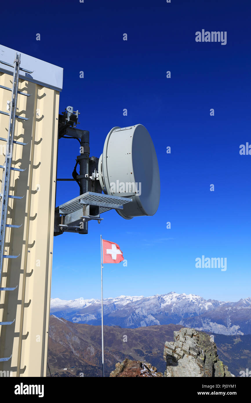 Telecommunication beam antenna on montain of the swiss alps Stock Photo